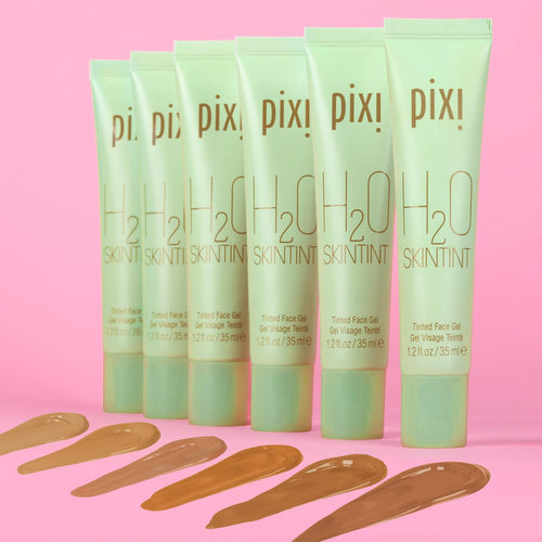 Pixi H2O Skintint tubes on a pink background view of medium shades view 2