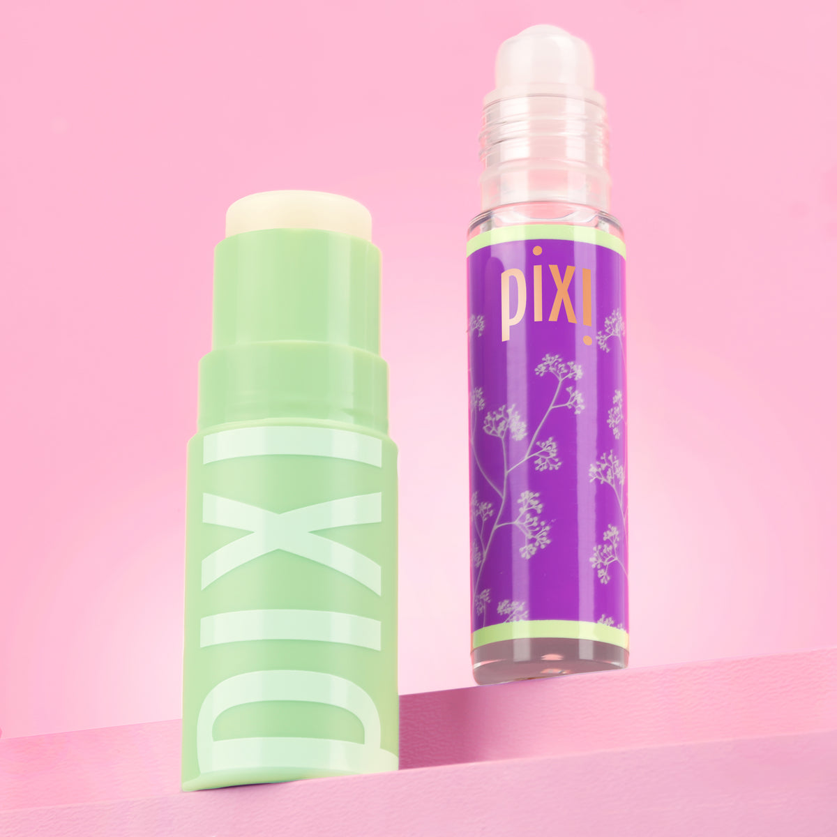 Petra's Overnight Reset featuring Glow-y Lip Oil and +Hydra LipTreat on a pink background -