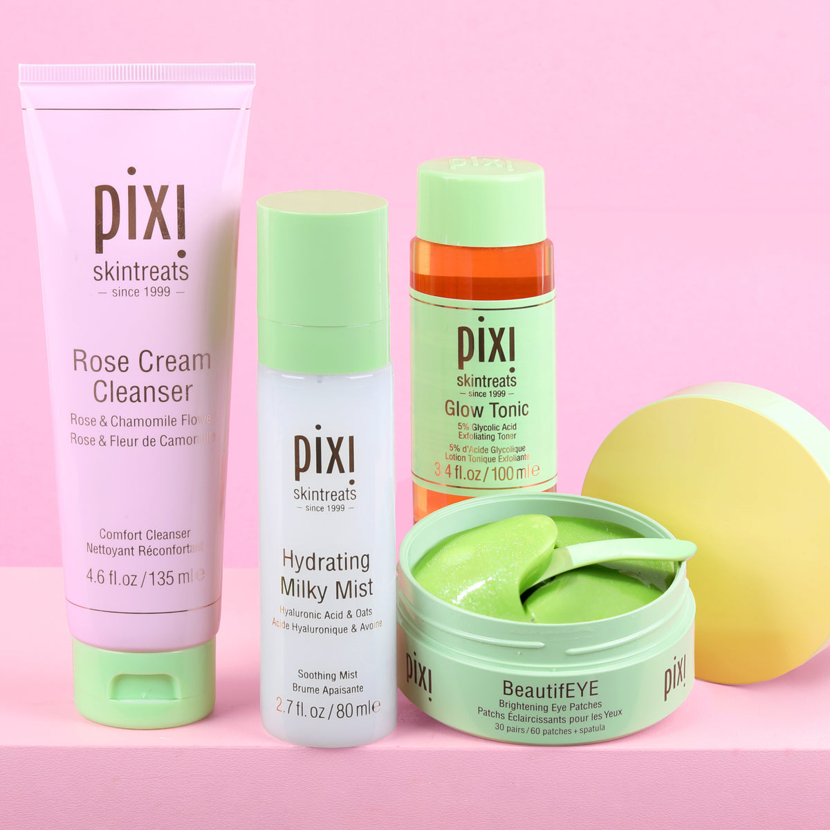 Pixi skincare products on a pink background