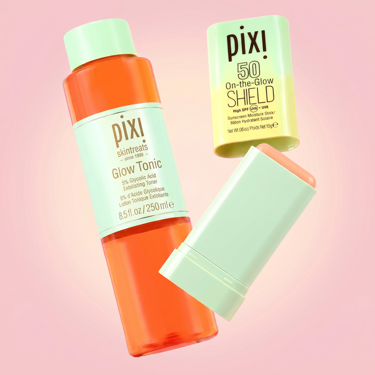 Pixi skincare products including Glow Tonic and SHIELD SPF 50 on a pink background